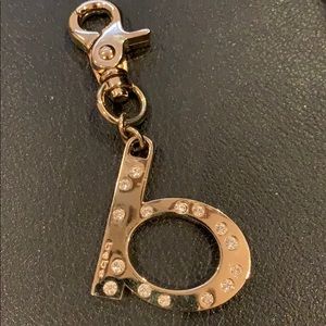Free with $20 purchase Bebe accessory for purse keychain